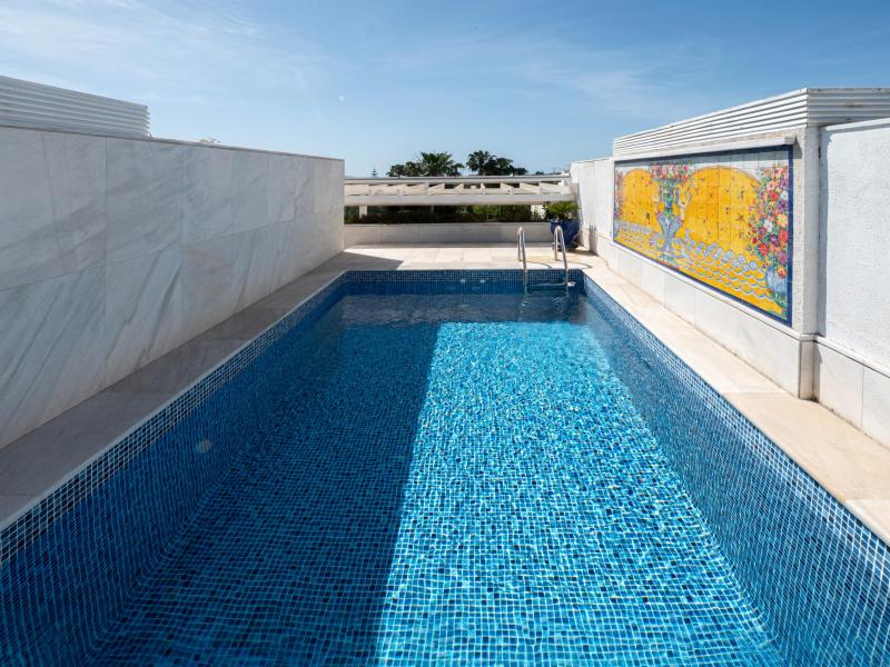 Private heated pool on the rooftop terrace