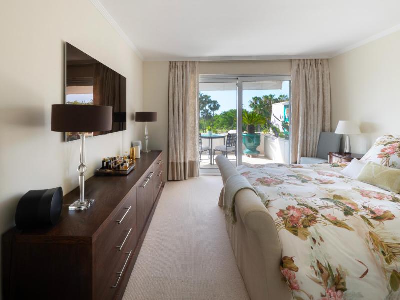 Double bedroom with fitted wardrobes and terrace access