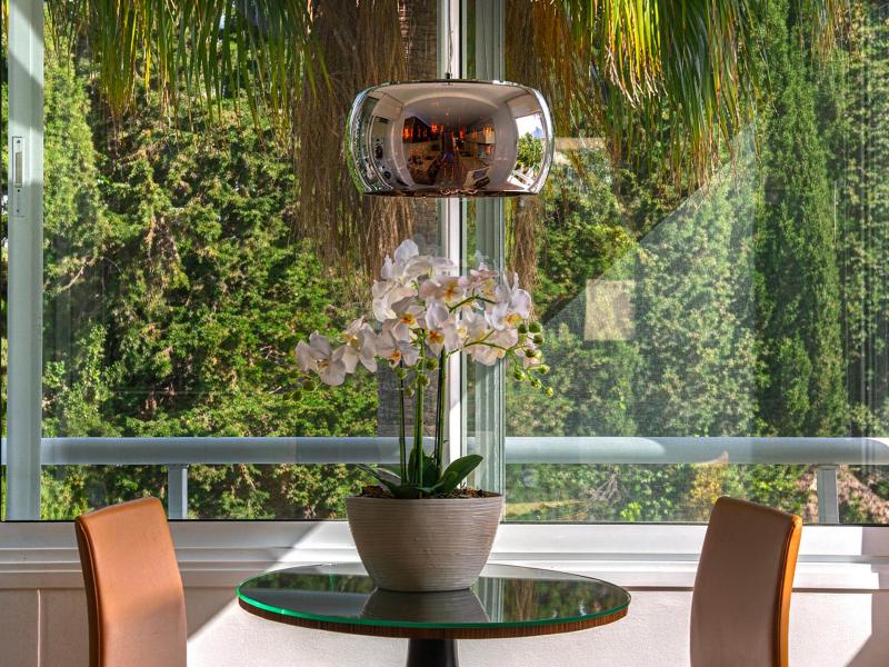 Breakfast area beside the kitchen with garden views